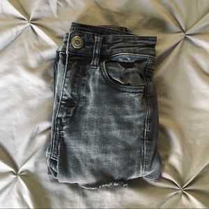 ae high rise black distressed skinny jeans